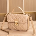 Quilted Kelly bag in apricot finish with gold clasp and elegant top handle strap - Khaki