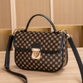 Quilted Kelly bag for ladies in black with gold floral ring print and metal lock detail - Metal Ring Black