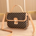 Brown quilted crossbody bag with clover pattern and cream leather handles - Circle Khaki