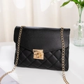 Classic black quilted crossbody bag with golden chain strap and square metal lock - Black