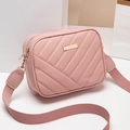 Quilted pink camera crossbody bag with V-shaped stitching and wide canvas shoulder strap - Pink