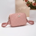 Pink quilted shoulder bag with white butterfly charm and matching wide fabric strap - Pink