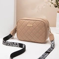 Quilted beige camera bag with a wide jacquard strap and decorative side tassel - Apricot