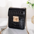 Elegant black crocodile pattern crossbody phone bag with gold chain strap on white table - Black