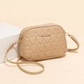 Beige crossbody camera bag with heart quilted pattern and dual zipper closure - Apricot