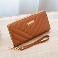Brown long quilted wallet for women with golden hardware and a wristlet strap - Brown