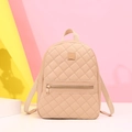 Beige quilted mini backpack with front zipper pocket and adjustable fabric straps - Khaki