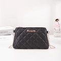 Classic black quilted shoulder bag with golden chain strap and Sunnysilly brand logo - Black