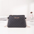 Quilted floral crossbody bag in black and navy with a rose gold chain strap - Print Black