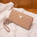 Dusty pink quilted long wallet with golden butterfly charm and fluffy pom-pom wristlet - Apricot