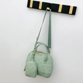 Mint green Boston bag set with quilted texture, matching pouch and fabric strap - Green