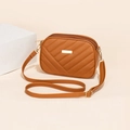 Brown crossbody camera bag with V-shaped quilting and gold rectangular metal plaque - Brown