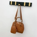 Brown quilted Boston handbag set with matching round pouch and flower zipper detail - Brown