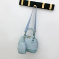 Light blue quilted Boston handbag 2-piece set with matching small round coin purse - Blue