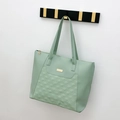 Mint green PU leather tote bag featuring diamond quilted pattern and gold flower charm - Green