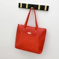 Quilted red tote bag with large capacity, featuring gold hardware and shoulder straps - Red
