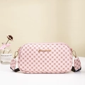 Pink camera bag with textured clover print and wide patterned shoulder strap - Pink Print