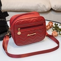 Dark red quilted V-pattern crossbody bag with wide nylon strap and gold-tone zipper - Red