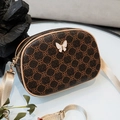 Borsa a tracolla vintage marrone con motivo floreale e fibbia a farfalla bianca - Caffè Stampato