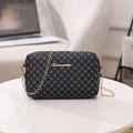 Black mini crossbody bag with grey circular pattern and gold chain strap for women - Black