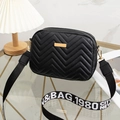 Black quilted crossbody bag with stylish wide fabric strap and golden metal detail - Black