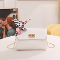 White woven texture crossbody bag with gold chain strap and decorative silk scarf handle - White