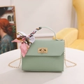 Mint green woven crossbody bag with silk scarf handle and golden chain strap - Green