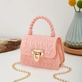 Pink mini jelly handbag with golden pyramid studs and twisted handle for summer - Pink