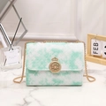 Quilted white and mint green chain crossbody bag with golden crown lock detail - Green