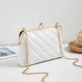 Elegant white quilted chain handbag with a gold metal frame and minimalist shoulder strap - White