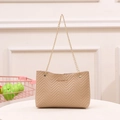 Beige quilted shoulder tote bag with gold chain strap and elegant chevron patterns - Apricot