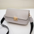 Light grey woven square crossbody bag with gold lock and wide jacquard strap - Gray