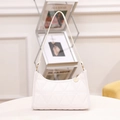 White quilted faux leather shoulder bag with gold circular emblem and triangle stitching - White Triangle Pattern