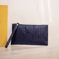 Navy blue crocodile pattern clutch purse with wrist strap and golden zipper closure - Dark Blue