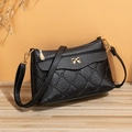 Sac bandoulière élégant en cuir gaufré noir avec nœud doré et coutures en losange - Noir