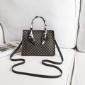 Dark brown geometric patterned handbag with black-and-white floral silk scarf handle - Brown Printed