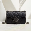 Fashionable black quilted shoulder bag with chain strap and luxury metal lock design - Black