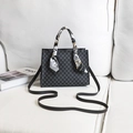 Black tote bag with geometric print and decorative scarf on handle, with shoulder strap - Black Printed