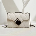 Chic white quilted crossbody bag with stylish chain strap and geometric metal buckle decor - White
