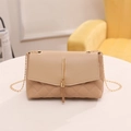 Beige quilted shoulder bag with gold chain strap and elegant tassel metal detail - Khaki