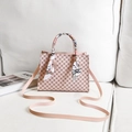 Pink printed crossbody handbag with monogram pattern and silk scarf wrapped handle - Pink Printed
