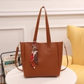 Brown leather tote bag with elegant silk scarf wrap and detachable shoulder strap - Brown