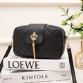 Fashion black quilted crossbody bag with golden crown tassel detail on magazines - Black