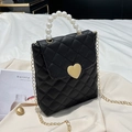 Quilted black mini square bag with golden heart lock and pearl handle accessory - Black