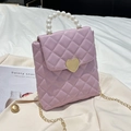 Pink quilted phone bag with pearl handle, gold heart lock, and metal chain strap - Pink