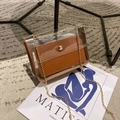 Transparent PVC crossbody bag with a brown leather inner pouch and gold chain strap - Brown