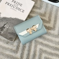 Mini gray-blue faux leather wallet with golden metal bow knot and white contrast stitch - Blue