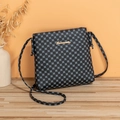 Women's blue geometric pattern square crossbody bag with gold logo on wood surface - Black Printed