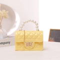 Mini jelly handbag in bright yellow with pearl handle and quilted pattern detail - Yellow