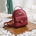 Mini mochila para mujer en color vino tinto de cuero PU con patrón de lichi - Burdeos
